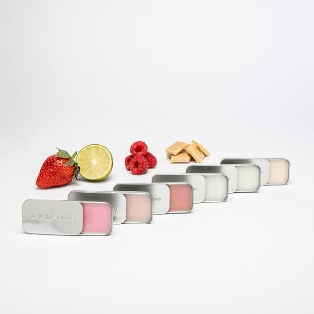Luscious Wild Olive Lip Balms in earthy tones, crafted to hydrate and soothe lips with natural, handmade care.