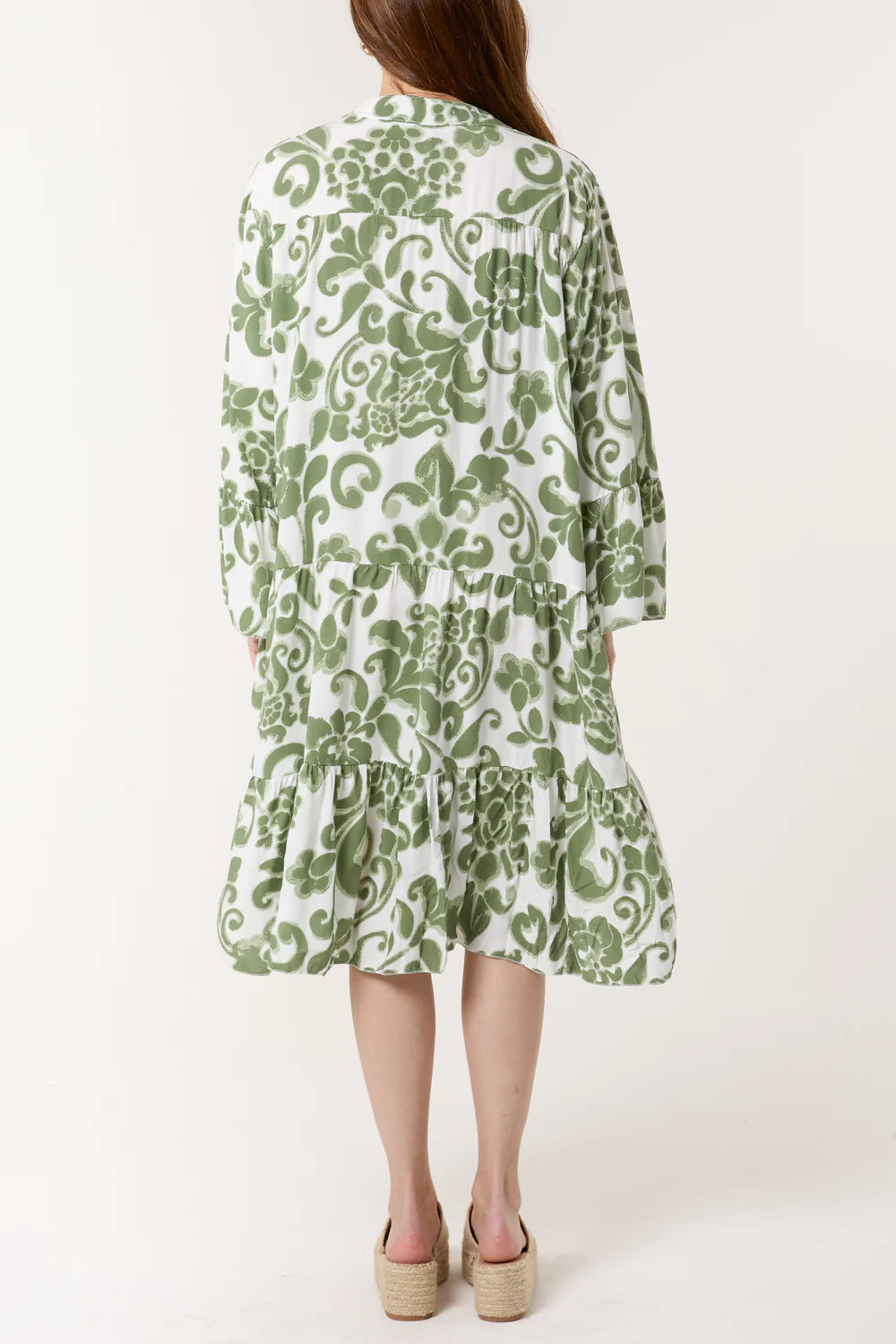 Vibrant green floral print dress with a flowy, flattering design, perfect for sizes 8-16/18, crafted in Italy.