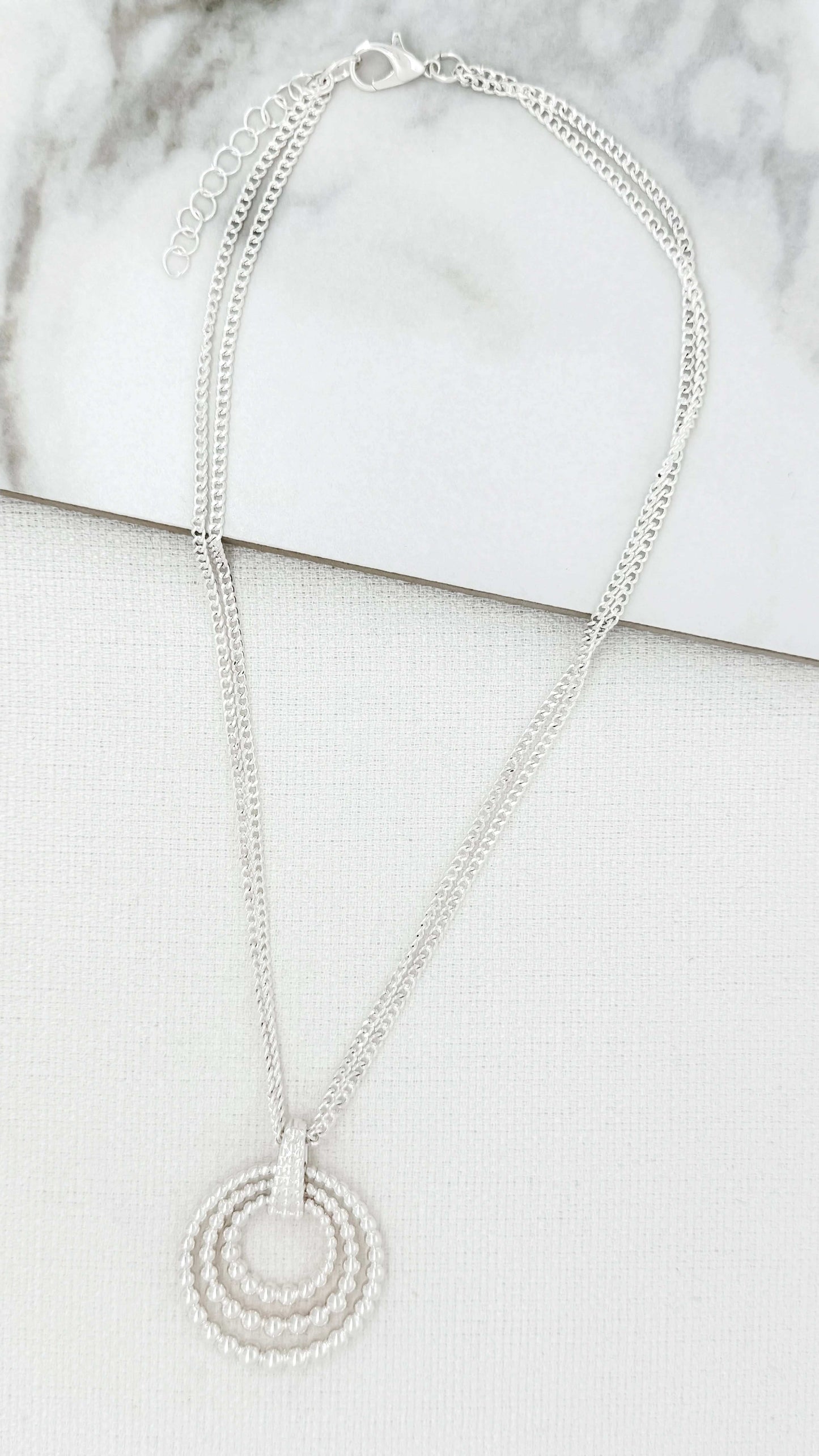 Envy - Short silver double chain necklace with circular bauble pendants