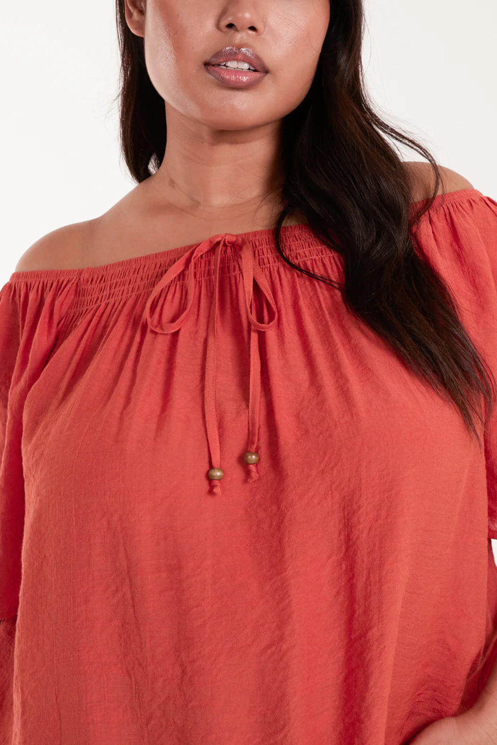 Elegant plus-size Curve Shirred Front Bardot Swing Top in size 18-20, featuring an off-shoulder neckline and a charming bow detail.