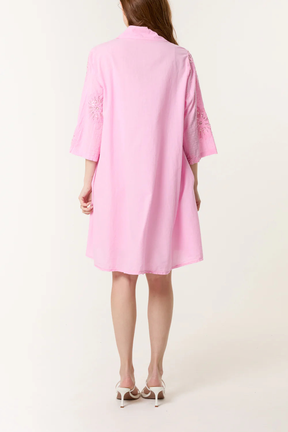 Vibrant sequin daisy patterns adorn this breezy cotton dobby shirt dress, a stylish one-size piece fitting UK 8-16.