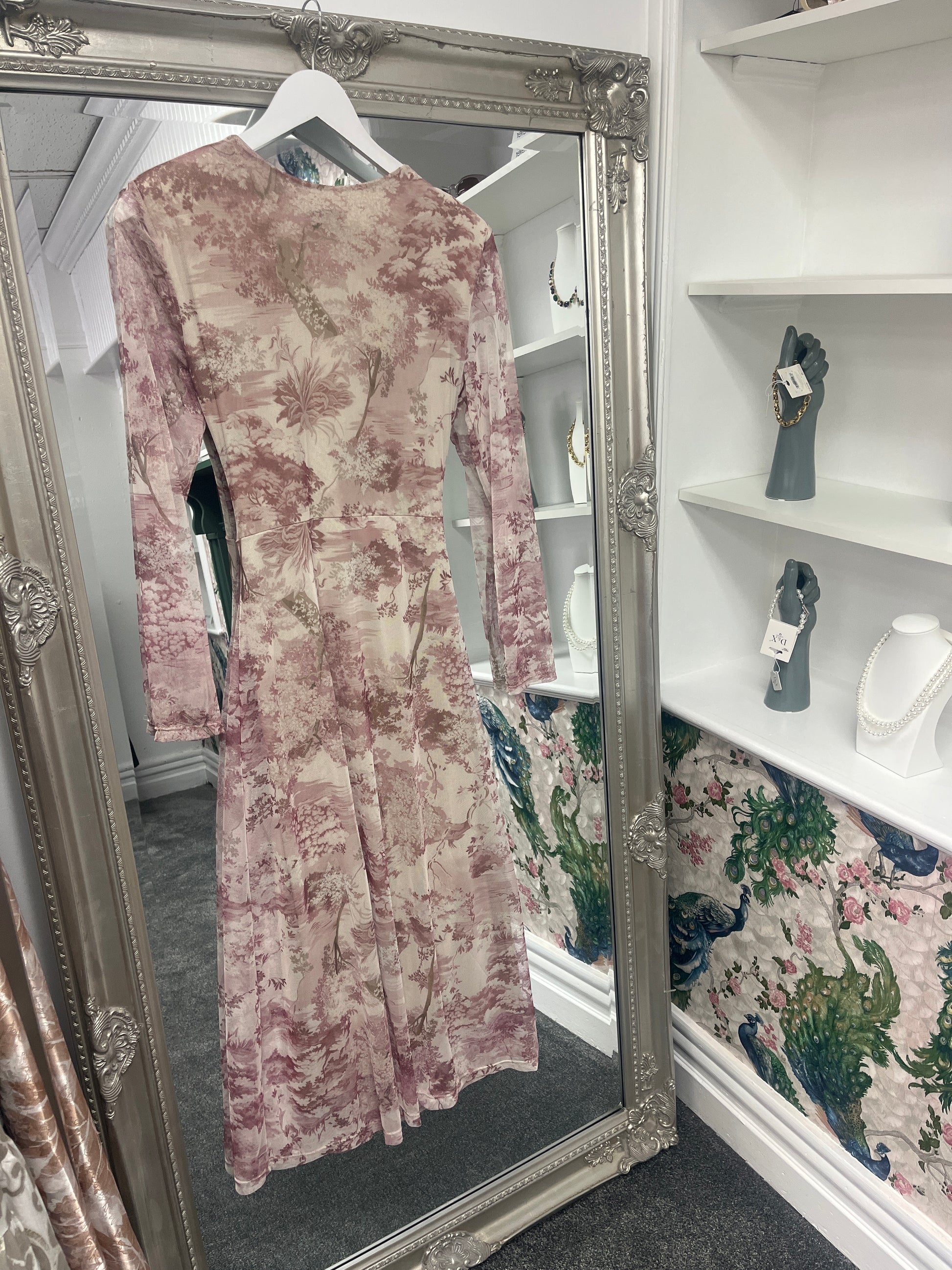 Elegant pink longsleeve crossover dress with a flattering fit, designed to suit sizes 8-14 with effortless style.