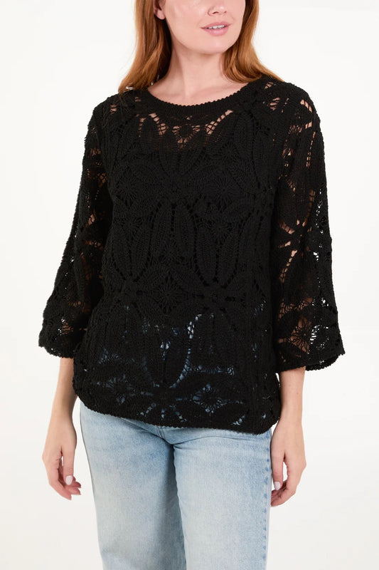 Delicate Wild Flower Crochet Top in size M/L, crafted from 100% cotton, featuring intricate floral patterns and a breezy fit.