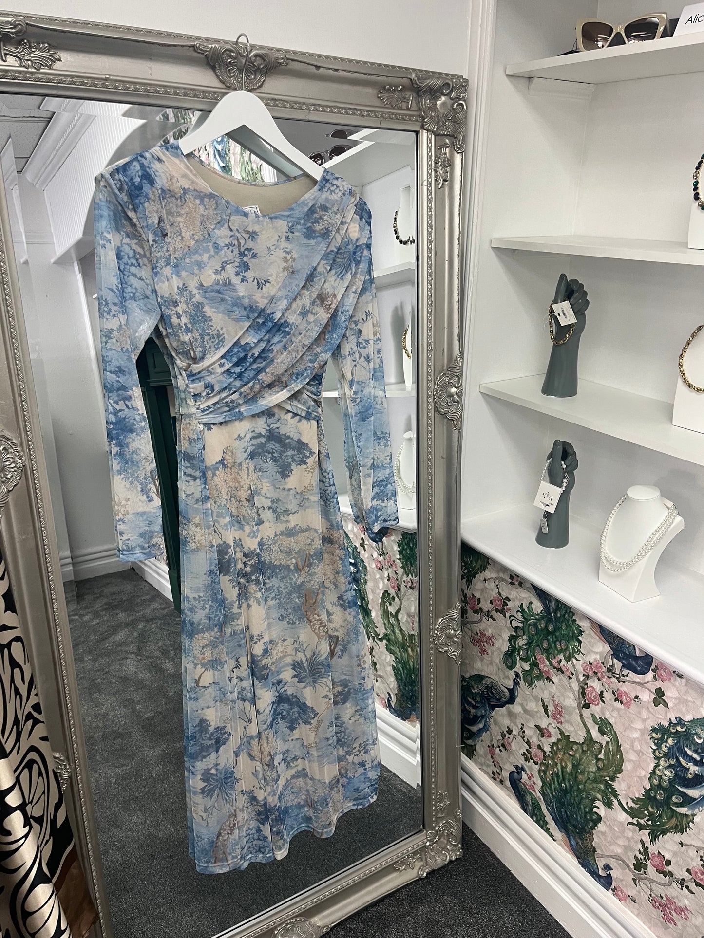 Elegant blue longsleeve crossover dress with a flattering fit for sizes 8-14, featuring a stylish wrap design.