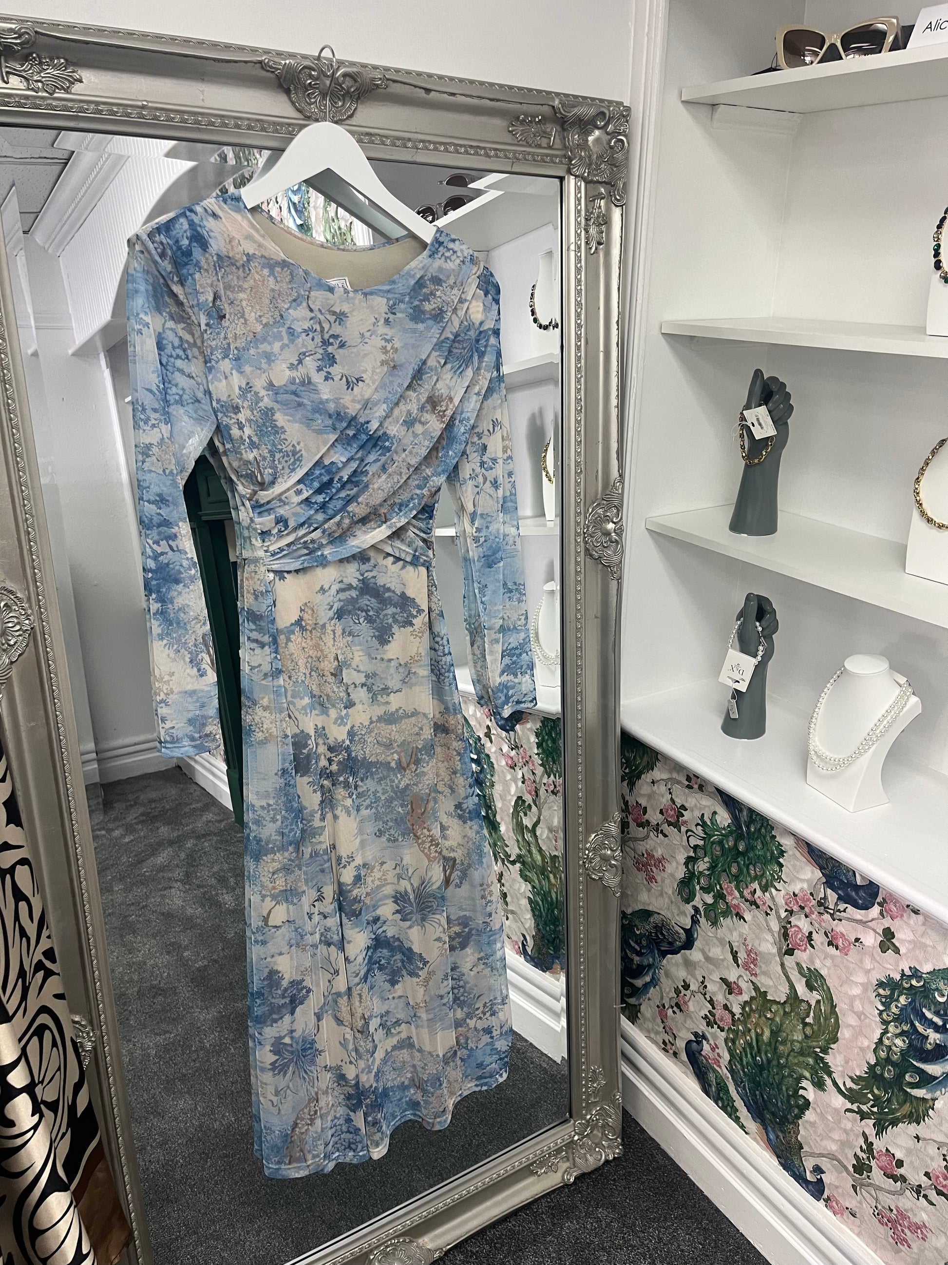 Elegant blue longsleeve crossover dress with a flattering fit for sizes 8-14, featuring a stylish wrap design.