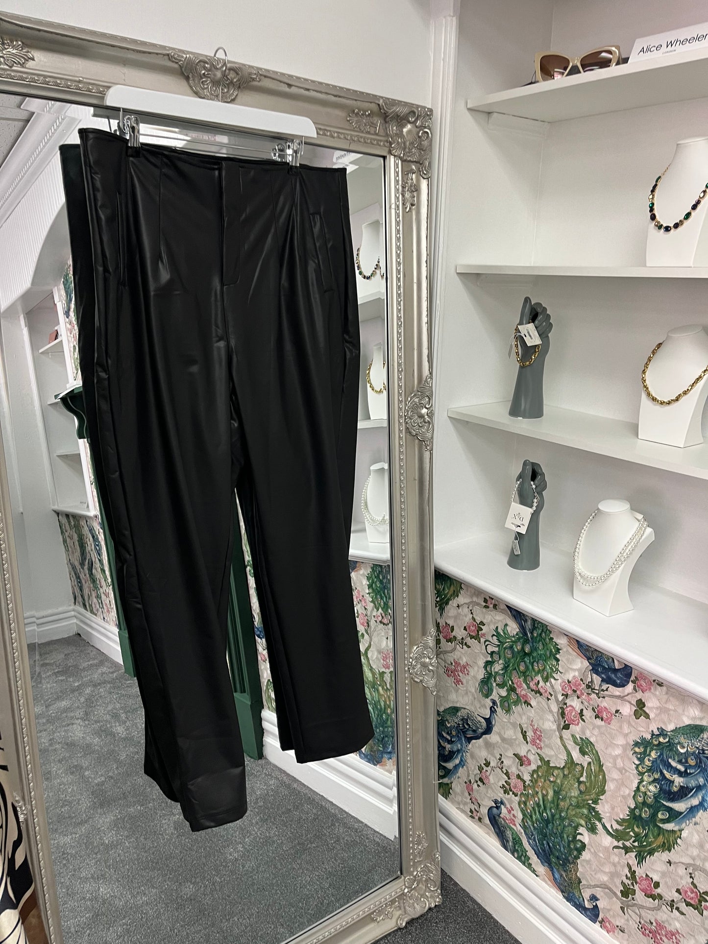 Sleek curve matte faux leather tailored trousers in size 22-24, showcasing a modern fit with a smooth, glossy finish.