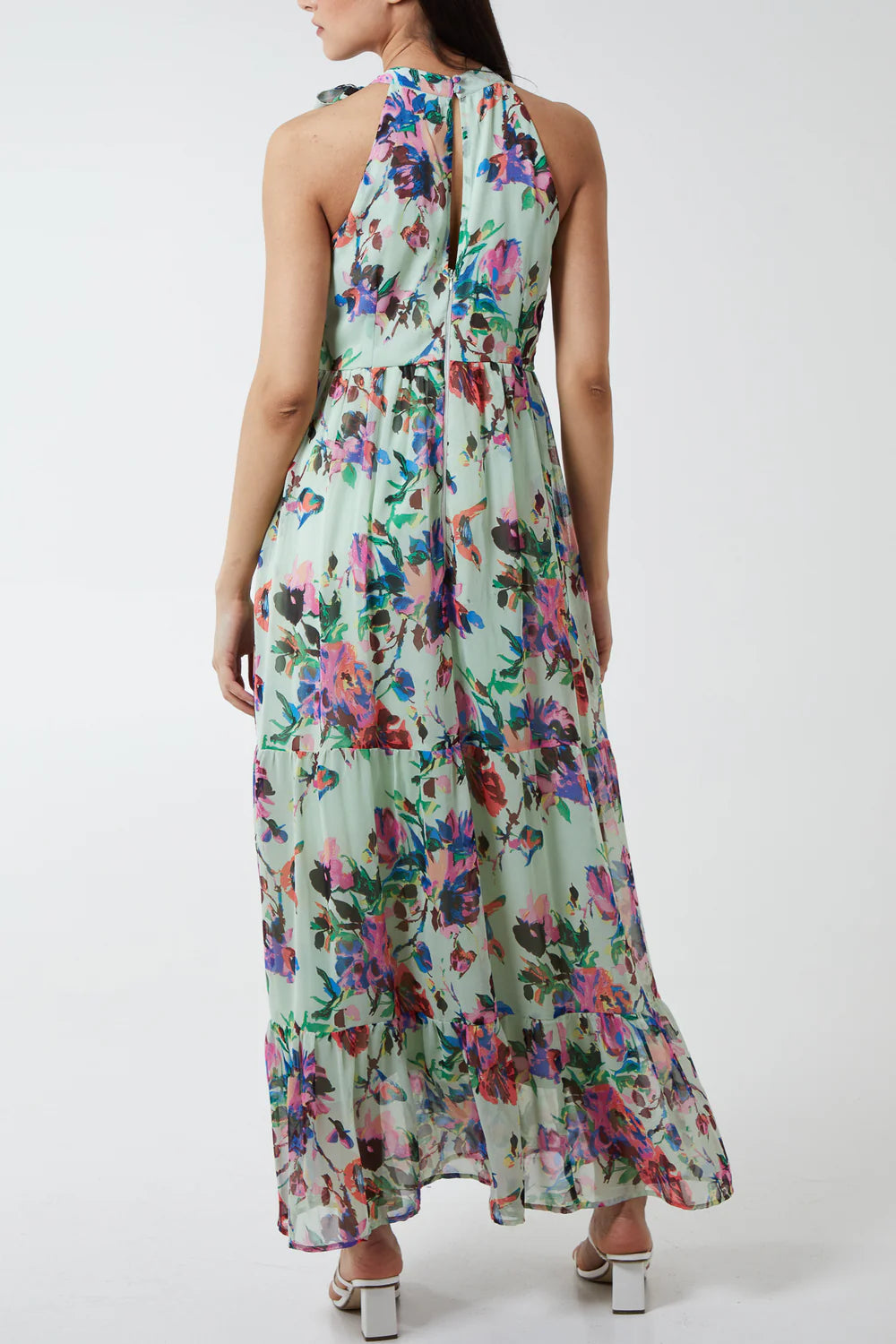 Elegant floral print maxi dress in size 14, featuring a tiered skirt, open back, and a chic tie-neck halter design.