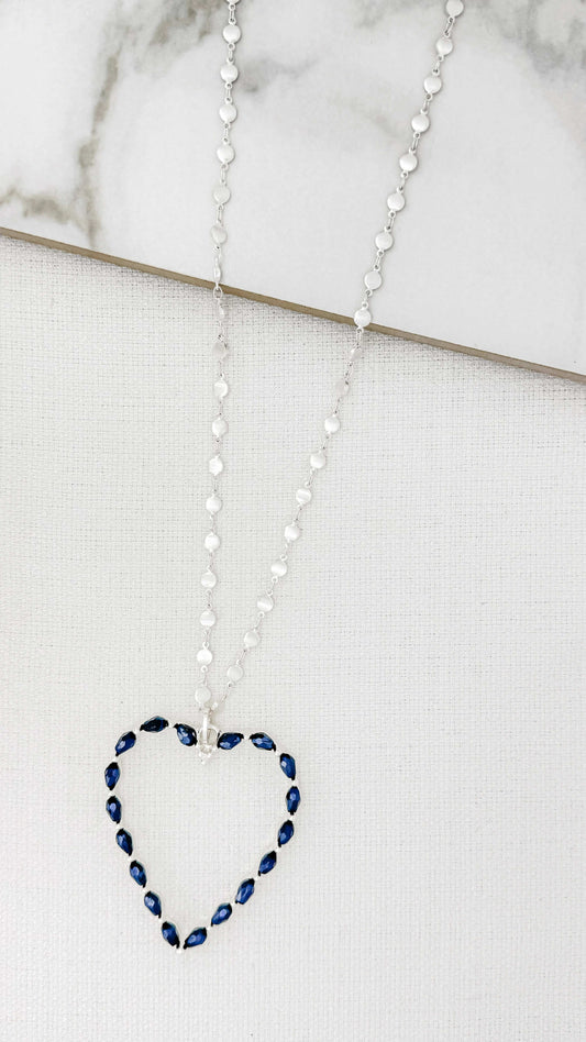 Envy - Long silver necklace with blue crystal open heart