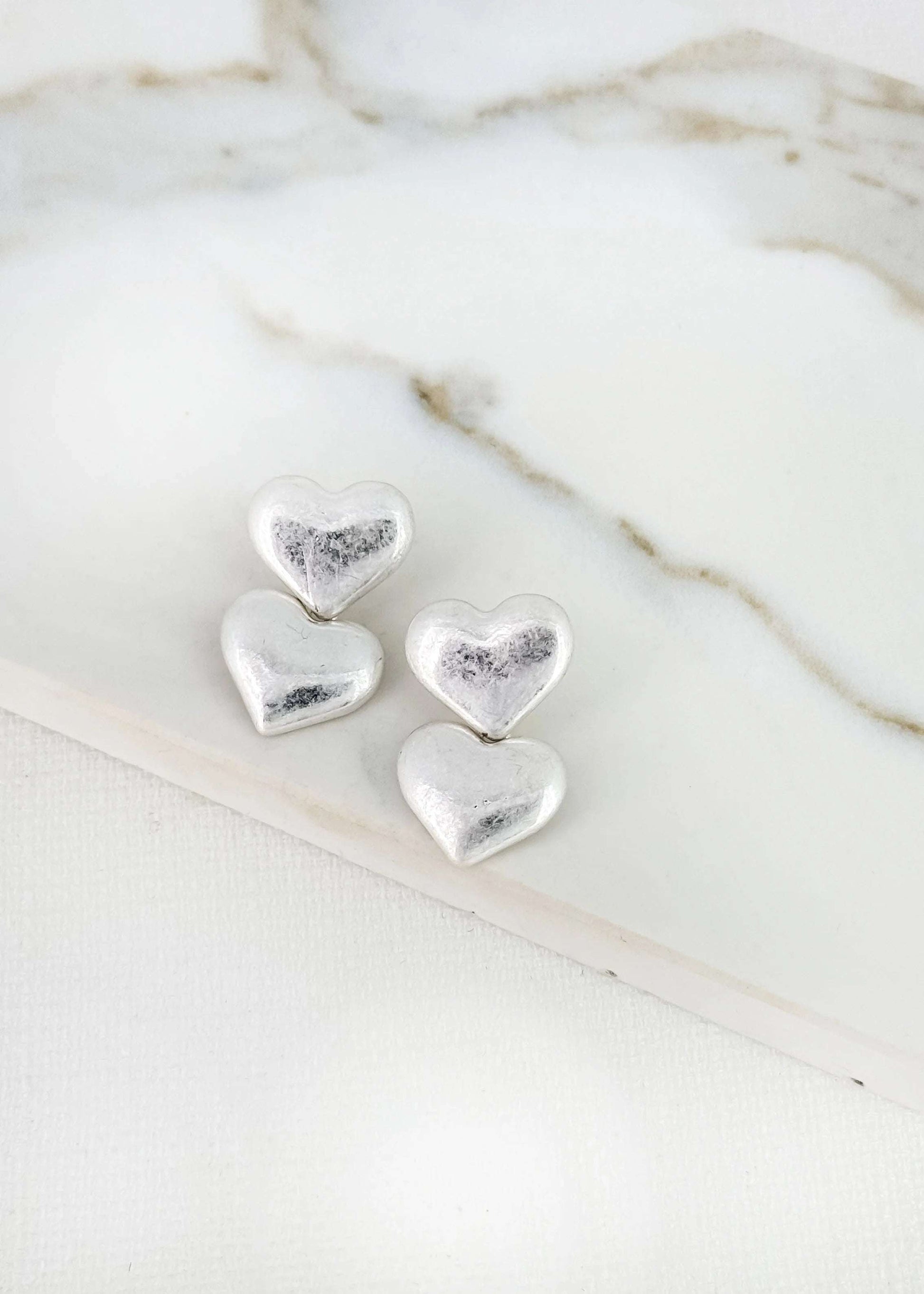Envy - Silver double heart dropper earring