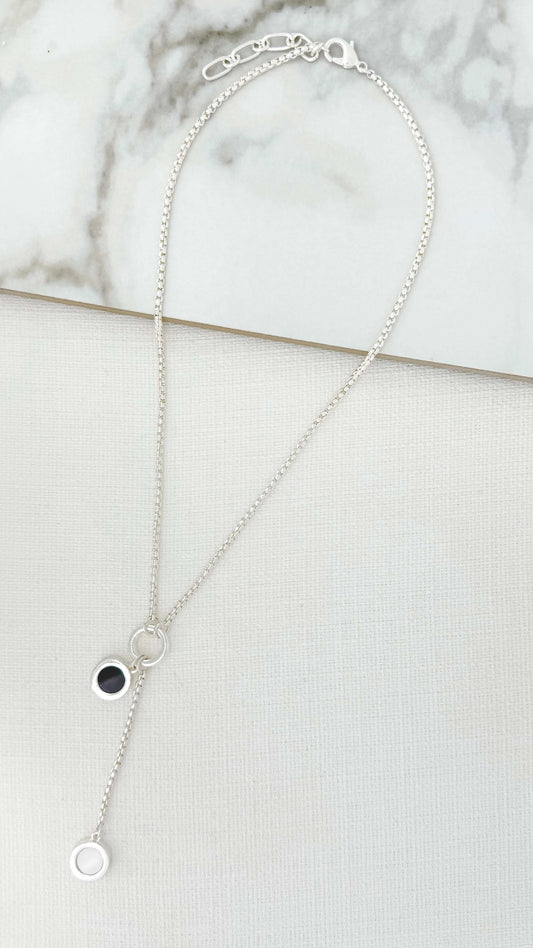 Envy - Silver necklace with black and white dropper pendant