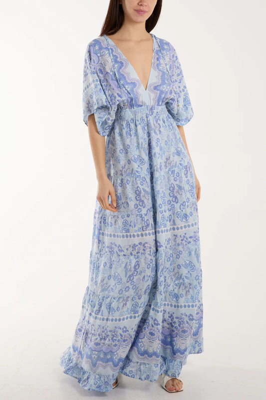 Flowy mixed print V-neck dress in size S with vibrant patterns and playful tassel details, crafted from 100% viscose.