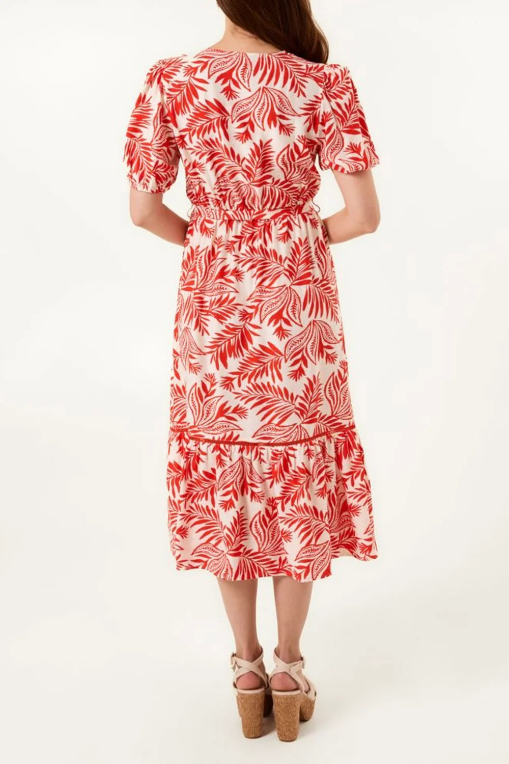 Vibrant leaf print midi dress in XL, featuring unique coconut buttons and a flattering fit for a tropical-inspired look.