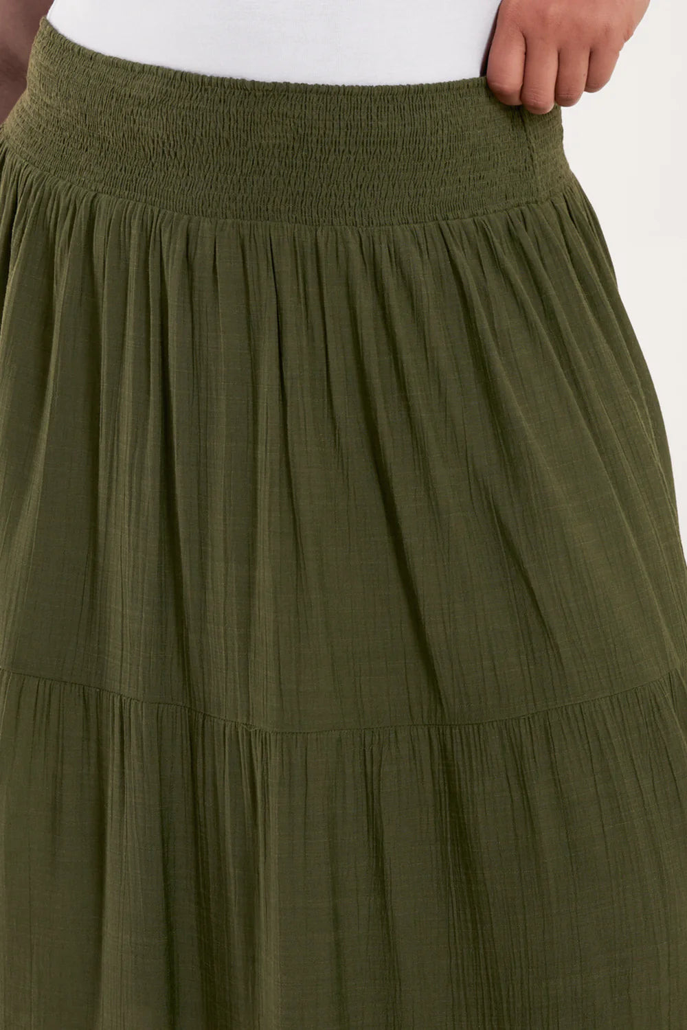 Flowy tiered maxi skirt in a lightweight fabric, featuring a shirred elastic waist for a comfy, flattering plus-size fit.